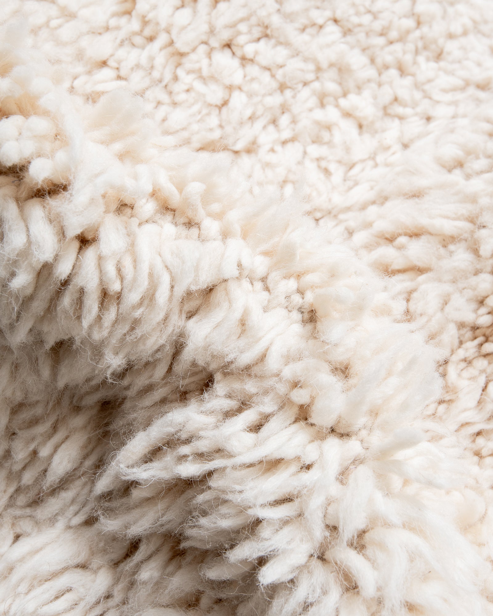 Modern, designer, handcrafted Berber rug from Morocco. Beniourain carpet with beautiful colours and patterns and fluffy wool texture.